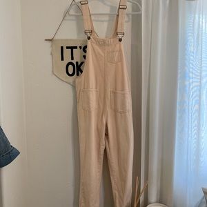 Pink denim overalls